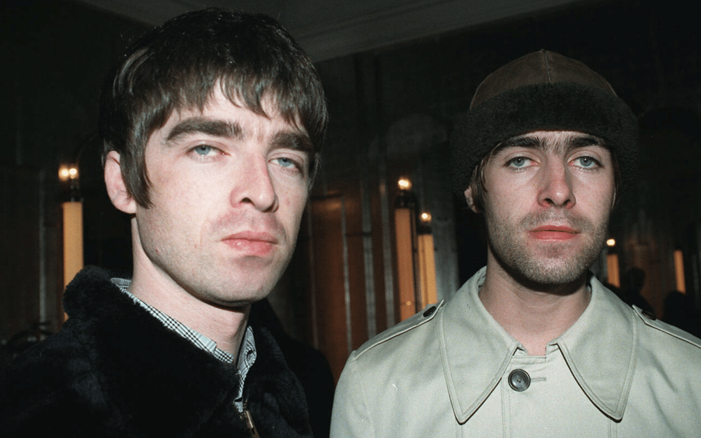 Brothers Liam (right) and Noel Gallagher, singer and guitarist respectively from the band Oasis, who are performing at a secret location in London for their loyal fans.